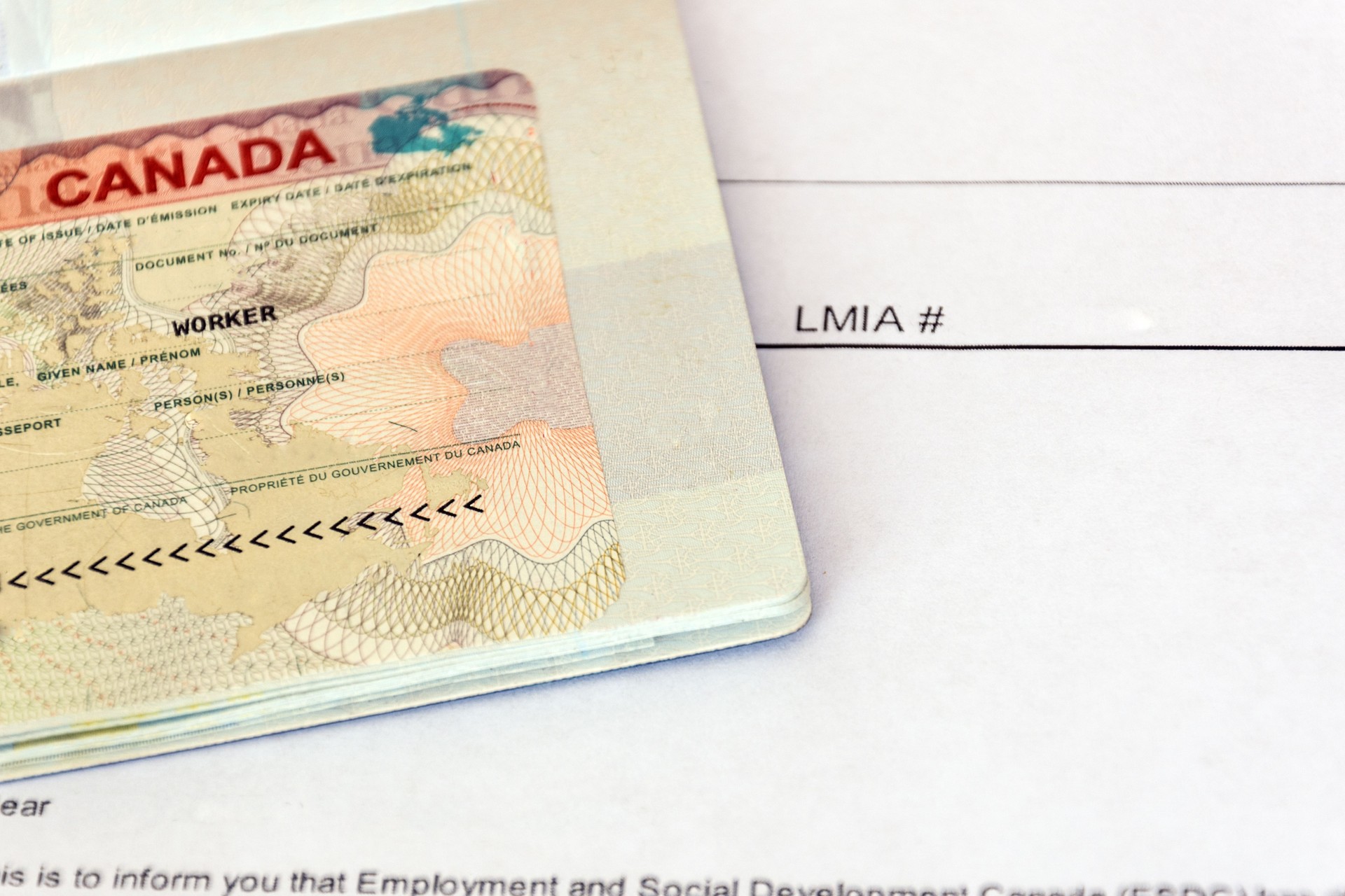Canadian working visa and LMIA, Labour Market Impact Assessment paper document.